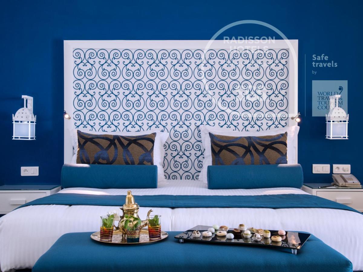 래디슨 블루 리조트 앤 탈라소 함마메트 외부 사진 A bedroom at Radisson Blu Hotel, Marrakech